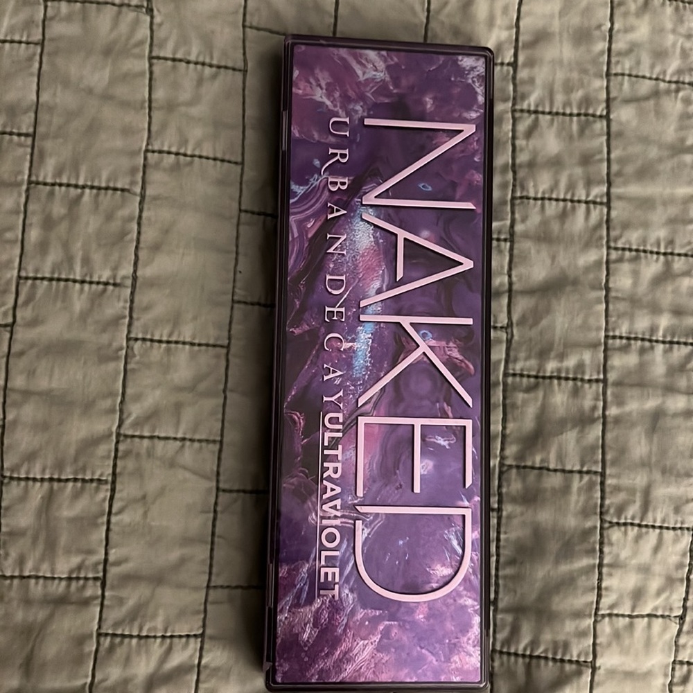Urban Decay Ultraviolet Palette. Used once. Includes Dual ended brush.